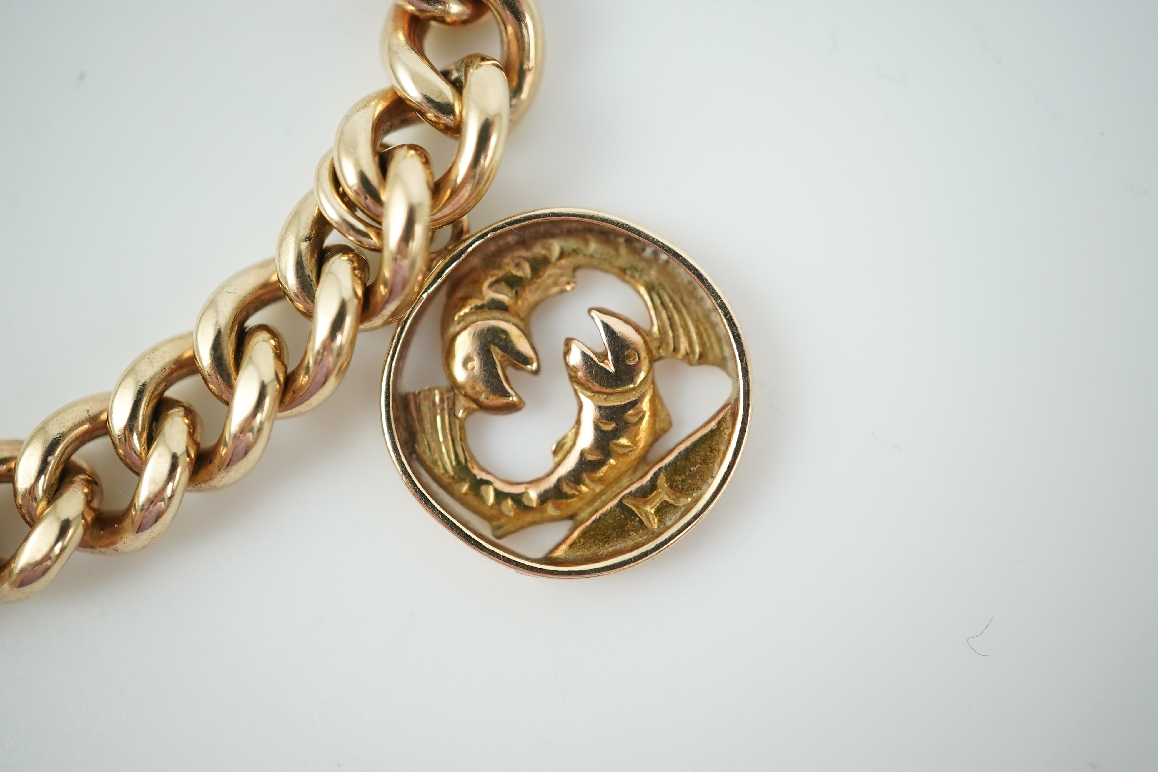 A 9ct gold charm bracelet, circa 1997